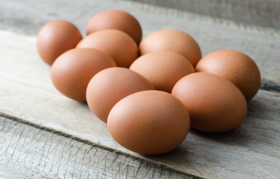 Eggs laid on a wooden - Still life