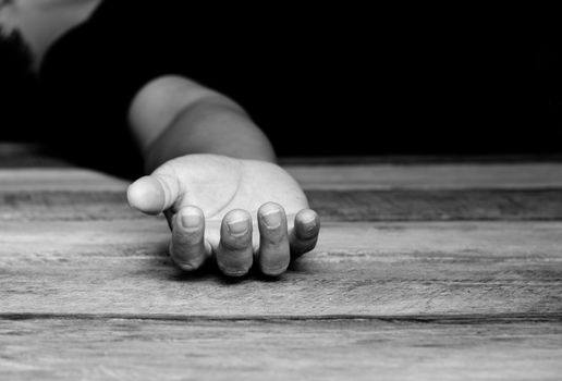 One hand on his bed, exhausted and sick - Focus hand