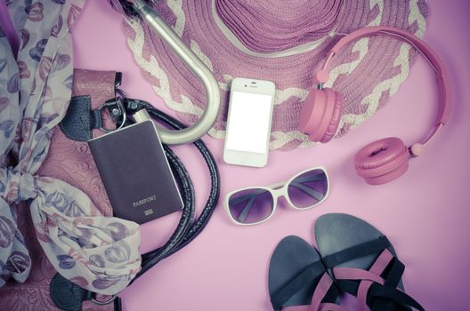 Travel accessories, bags, scarves, umbrellas, wallets headphones. Vodafone Passport smart shoes ready for the trip.