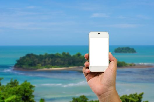 Mobile smart phone behind a of island is beautiful