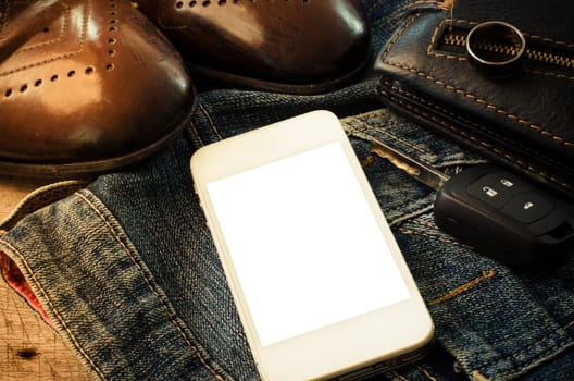 Clothing accessories, jeans. Shoes. Smart phones, car keys.