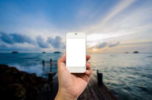 Mobile smart phone behind the harbor is beautiful.