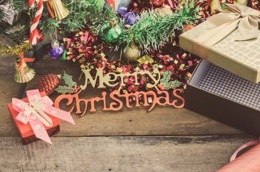 Gift boxes celebration of Christmas coming on the wooden floor.