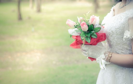 Beautiful bouquet of flowers in hand the bride.