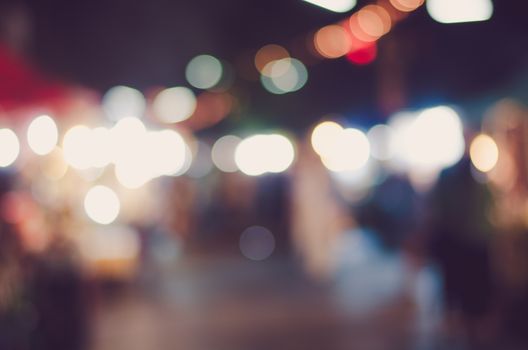 Blurred Crowd of people on street background, Vintage Toned Image.