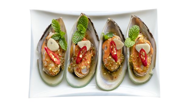 seafood dish with green mussel and  spicy sauce