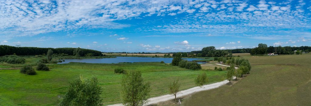 Panoramic view of the swimming, fishing and nature area Eixen lake. Shot from the lookout tower