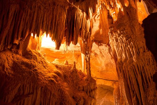 Cave formations from soft smooth areas to the  unique shapes of stalactites hanging from the cave like icicles