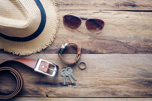 accessories for travel on wood floor- tone vintage