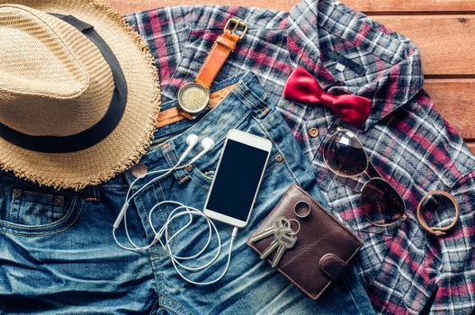 Accessories and apparel for men on a wooden floor - life style