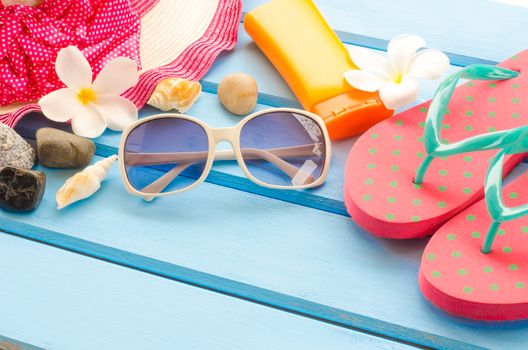 Accessories costume with travel for summer on blue wooden floor