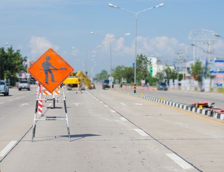 Signs warning Road repairs