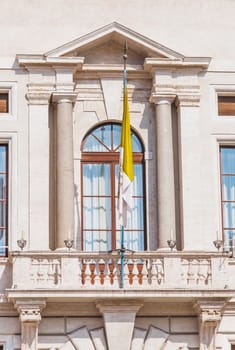 Balcony and Vatican Flag on St. Peter's Square from Rome to Vatican in Italy