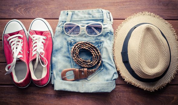 Travel Clothing accessories Apparel along on wood floow