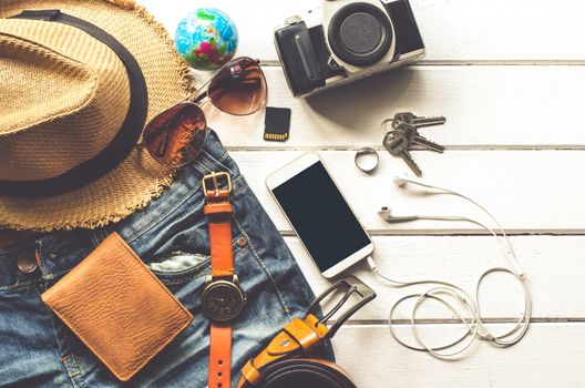 Travel Clothing accessories Apparel along for the trip on white wood floor