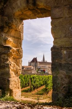 Looking through the great wall at saint emilion, remnant of domenican monastery, Aquitaine, France