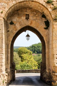 wall gate opened on dordogne valley at domme, perigord noir, aquitaine, france