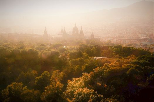 barcelona cityscape at sunset from montjuic hill