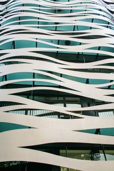 Façade of the Suites Avenue Building by architect Toyo Ito on Passeig de Gràcia, Barcelona, Spain.