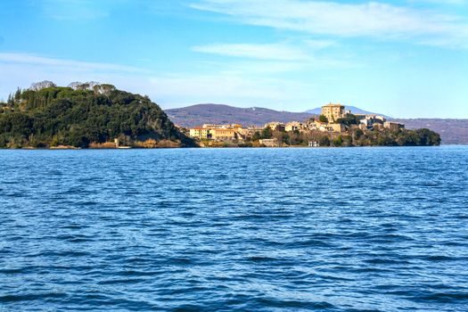view of capodimonte from Marta village, on Bolsena lake, Lazio, Italy