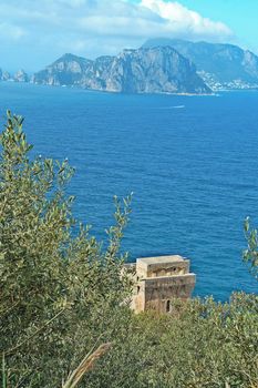 tower on the path to Punta Campanella and landscape of sorrento's peninsula and gulf, Naples, Italy