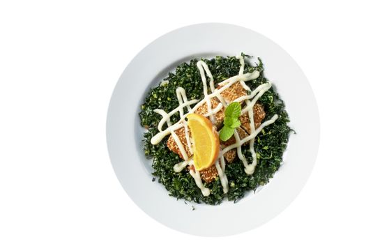 fried chicken and crispy kale with orange sauce