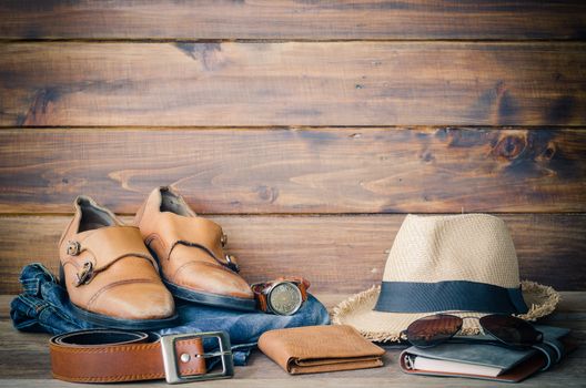 Travel Clothing accessories Apparel along on wooden floor 