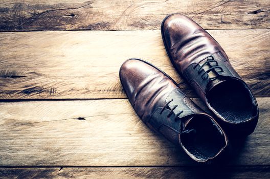 Leather shoes on the wooden floor.