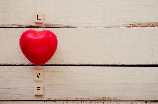 Valentine day background with heart and the word love