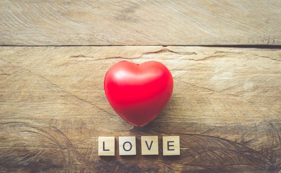 Valentines Day background with hearts and the word love.