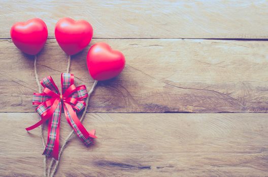 Valentines Day background with three hearts for love