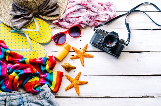 Accessories costume with travel for summer on wooden floor