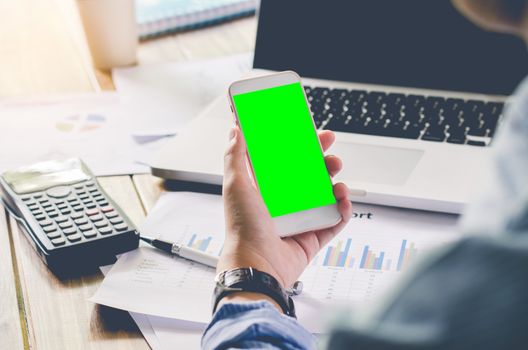 Businessman working with for smartphone 