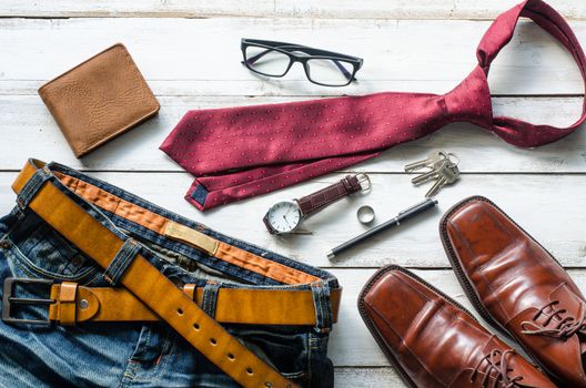 Clothing and accessories for Men on the wooden floor