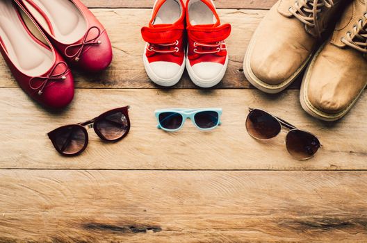 Children's and adult's sunglasses and shoes according to their lifestyle for travel