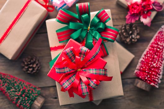 Gifts for special moments on wooden floor. 