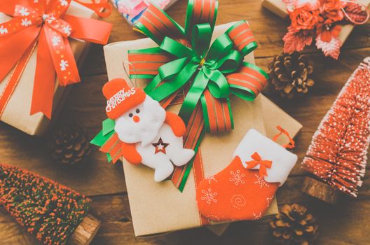 Gifts for special moments on wooden floor. 