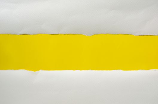 The paper is torn on a yellow background and there is a cutoff to the free space for your text. 