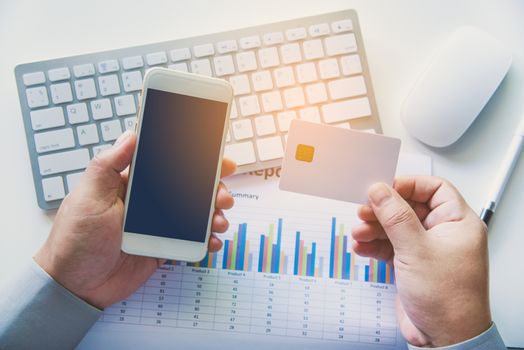 Top view Credit Card Holders Used Laptops and smartphone Ordering and Payment - Concepts of Using Technology in Business
