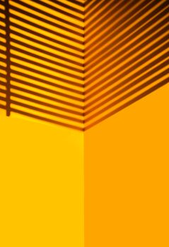 Yellow wall with black shadow on top