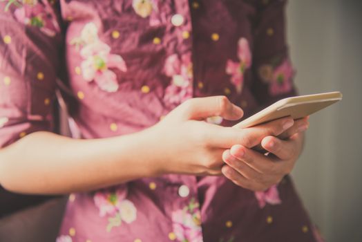 Man using smartphone for data connection and search to data