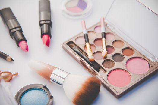 Set of decorative cosmetics for women on white background