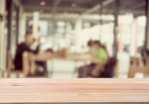 The plank was laid for product show. And there is a cafe blurry into the 