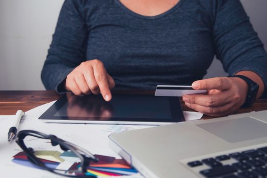 Credit Card Holders Used Laptops and smartphone Ordering and Payment - Concepts of Using Technology in Business