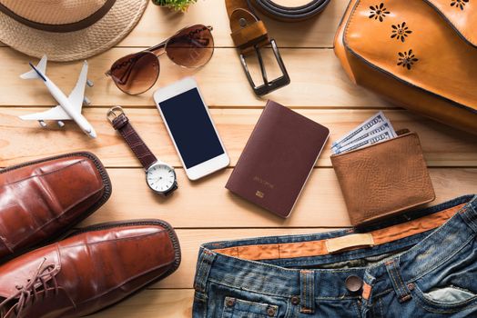 Travel Clothing accessories Apparel along on wooden floor