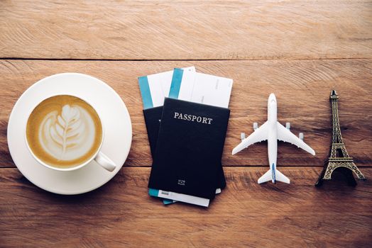 top view  passport and smartphone on wooden table, for travel concept