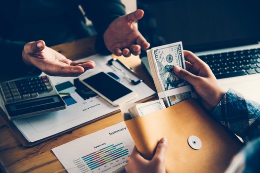 Business people are coordinating the financial business, bank officials are doing financial transactions to customers.