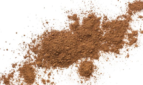 Pile cocoa powder isolated on white background, top view