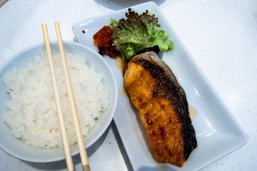 Japanese grilled salmon food isolated. Sea food of fresh raw Salmon grilled and  on rice of Japanese tradition food restaurant