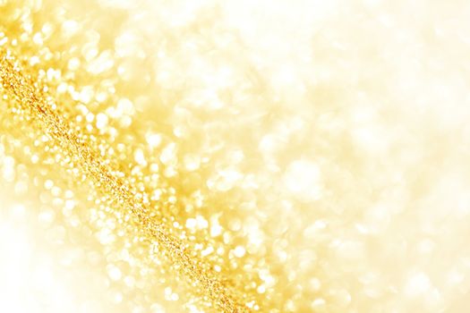 Abstract glitter bokeh holiday golden background